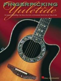 Fingerpicking Yuletide : 16 Songs Arranged for Solo Guitar in Standard Notation and Tab